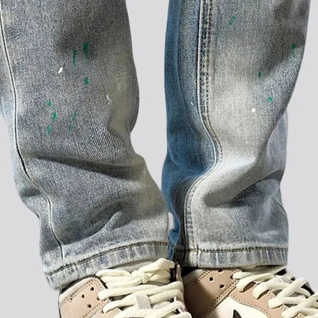 Grunge men's distressed jeans
