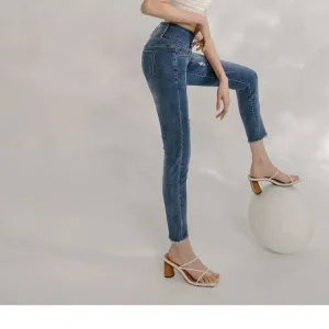 HIGH WAIST RIPPED ELASTIC SKINNY DENIM PANTS
